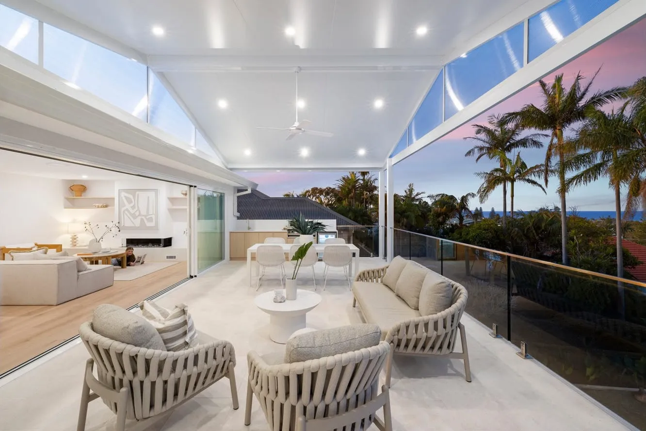Covered outdoor entertainment area at the Collaroy home with dimmable downlights